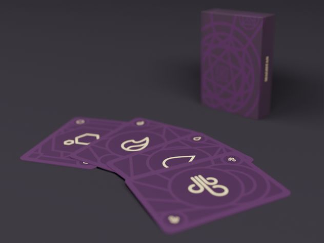 The Magistan card box with the four element cards spread out in front of it